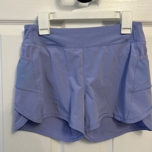Athleta Girl Record Breaker shorts. Size L/12. Light purple color.
